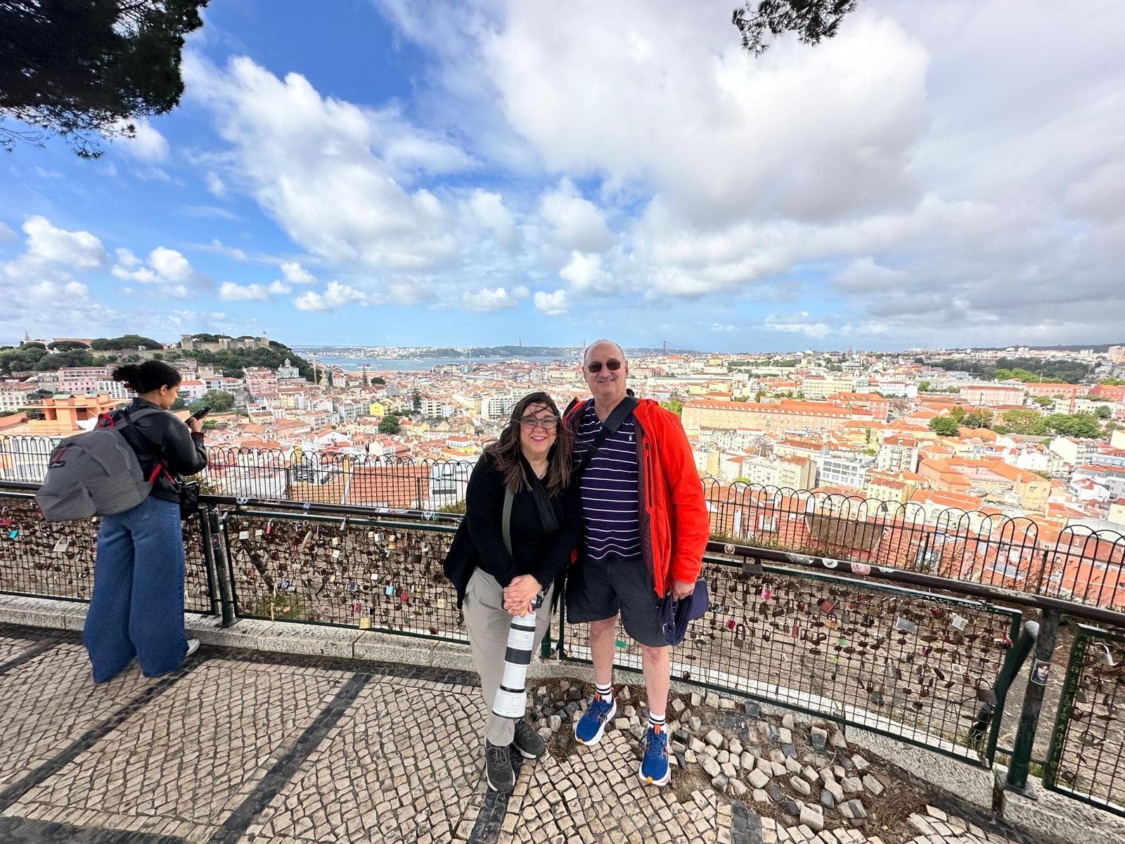 Travel-Luck travelers at a panoramic city viewpoint in Portugal