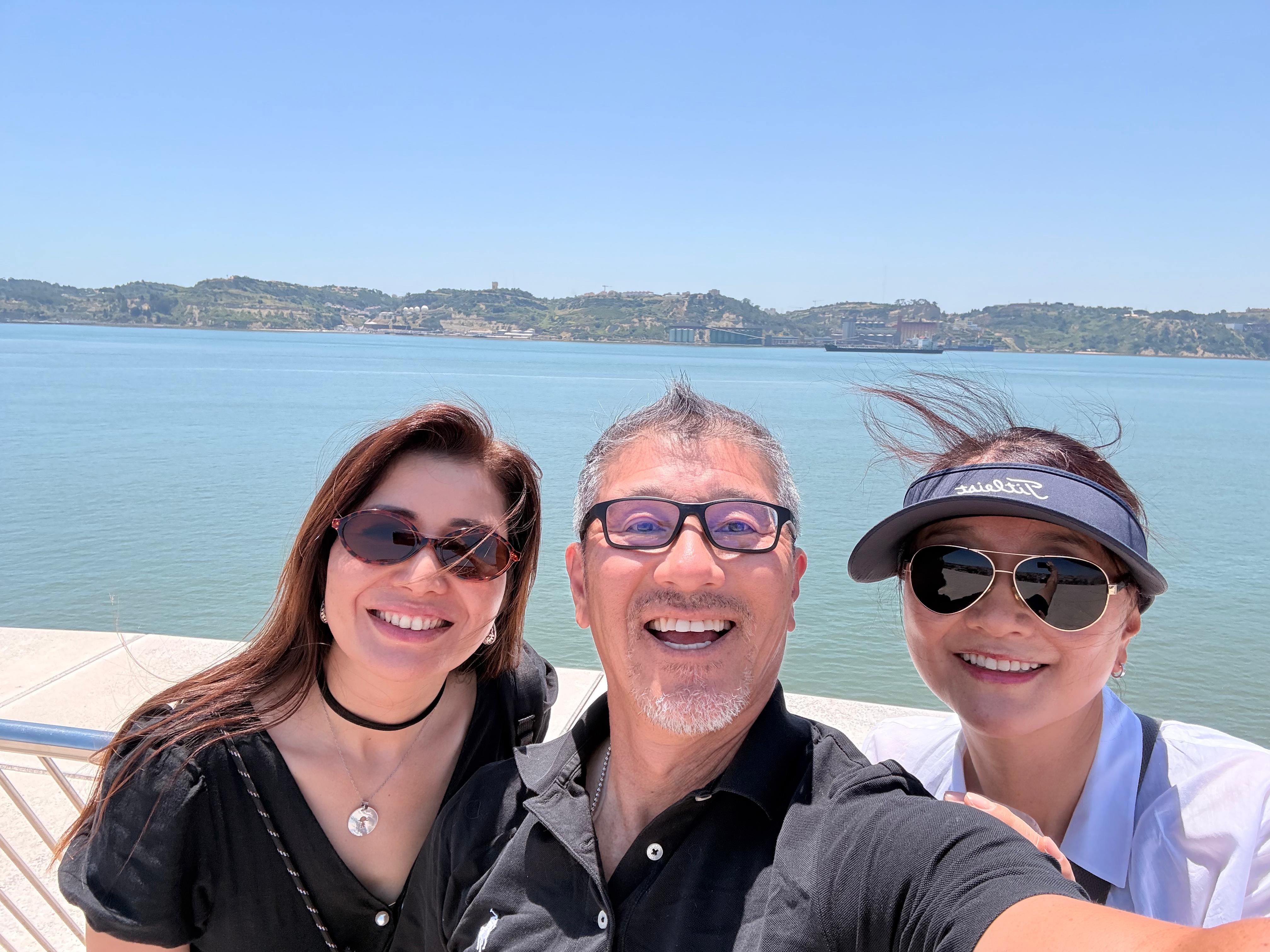 Travel-Luck clients smiling by the Atlantic coast