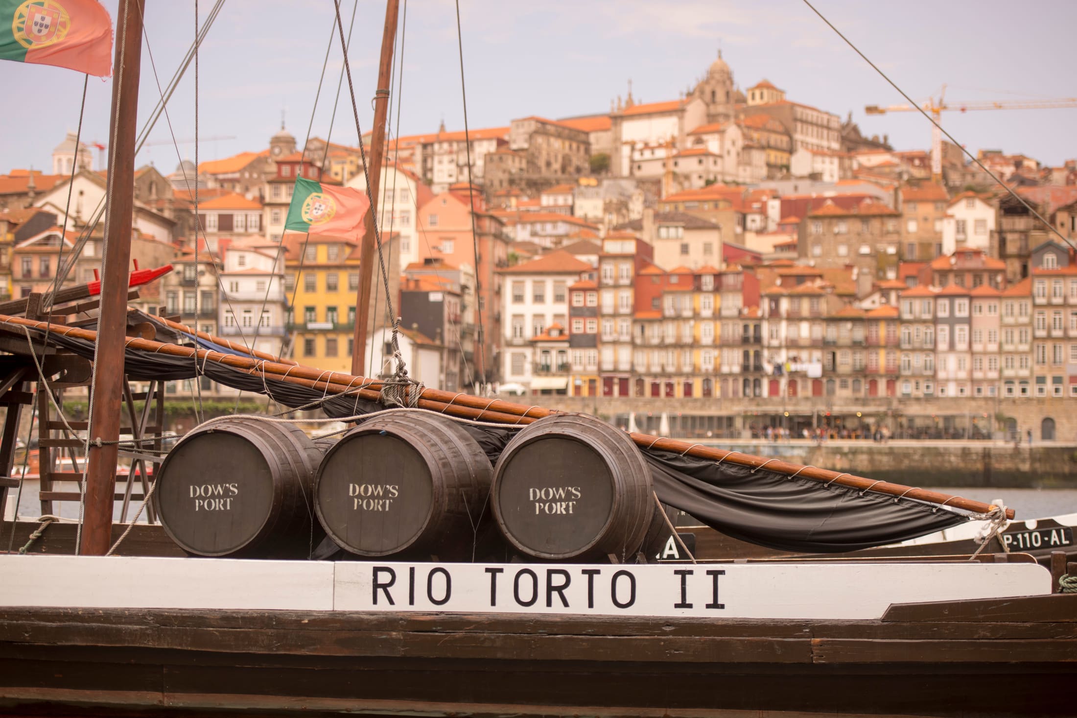 Port wine barrels on a traditional rabelo boat in Porto