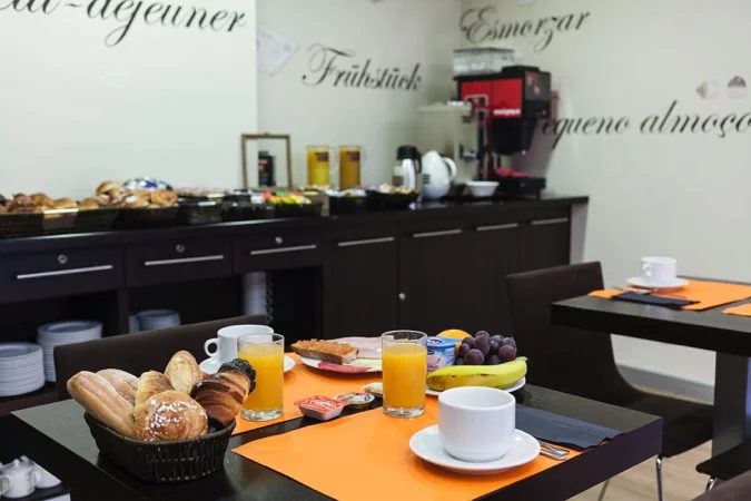 Breakfast tables and buffet at Acta Antibes.
