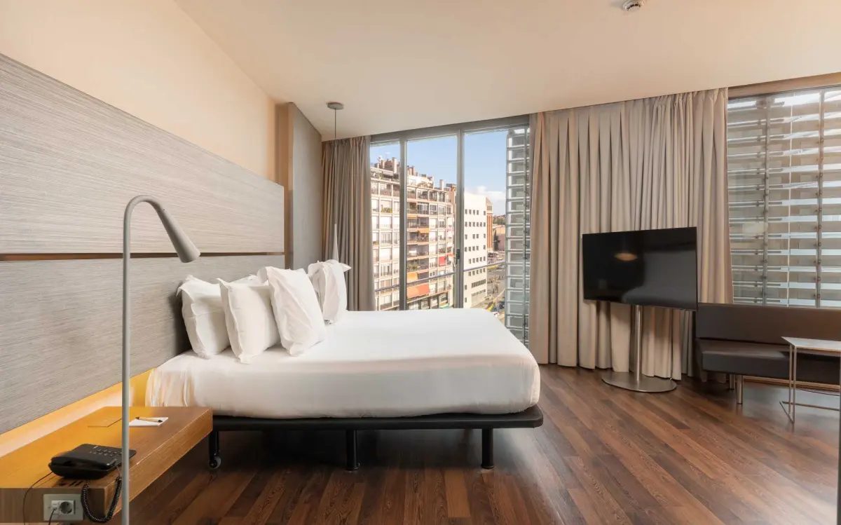 Double Deluxe bedroom at B-Hotel, with corner glazing.