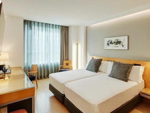 Classic Twin room at Sercotel Caspe.