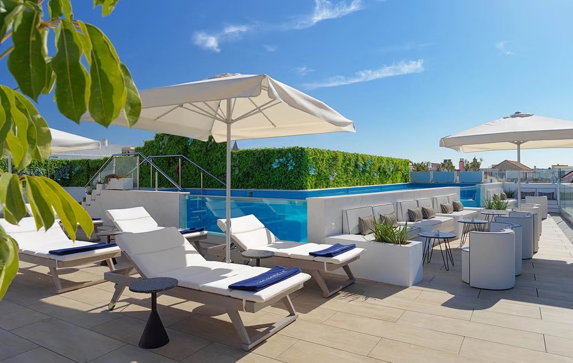 Rooftop pool terrace at H10 Casa de la Plata