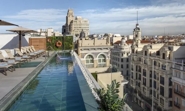 Narrow rooftop pool and Gran Vía skyline at Catalonia Gran Vía Madrid.