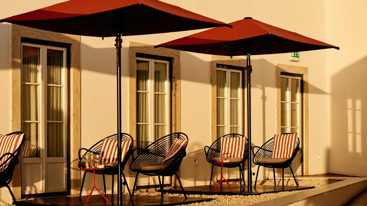 Furnished private deck outside the Terrace Rooms at Memmo Alfama