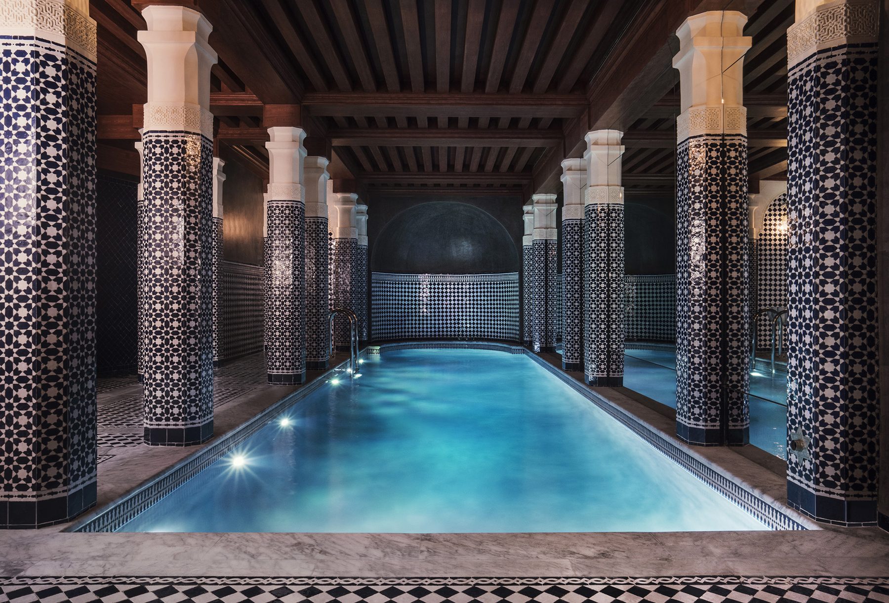 Indoor pool between tiled columns at Maison Proust.