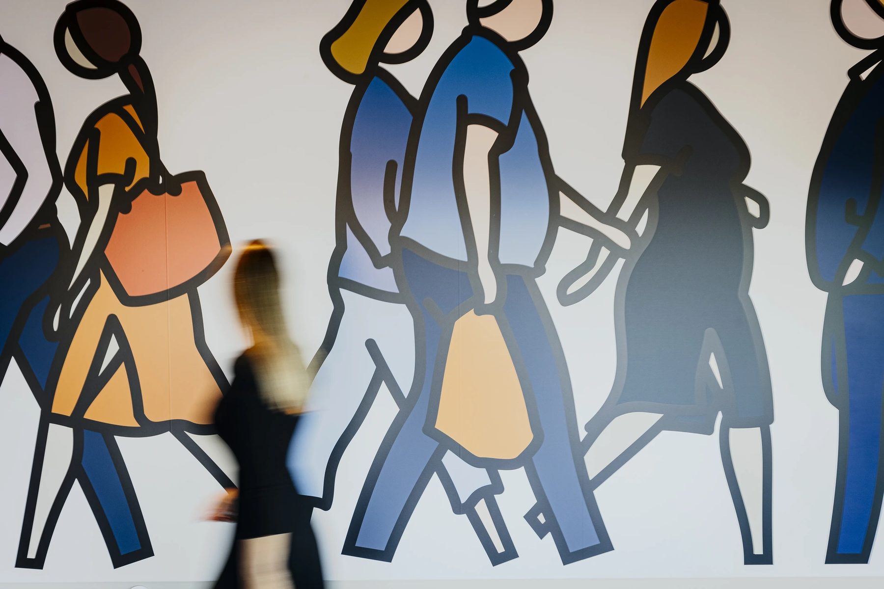 Large colourful figure mural inside Torel Private Collection’s art space.