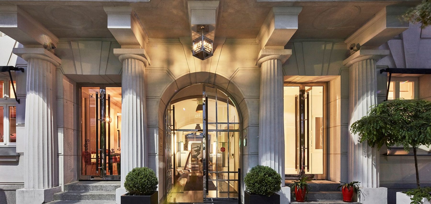 Columned courtyard entrance at H15 Boutique Hotel