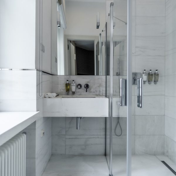 White bathroom and glass shower in the H15 Junior Suite gallery