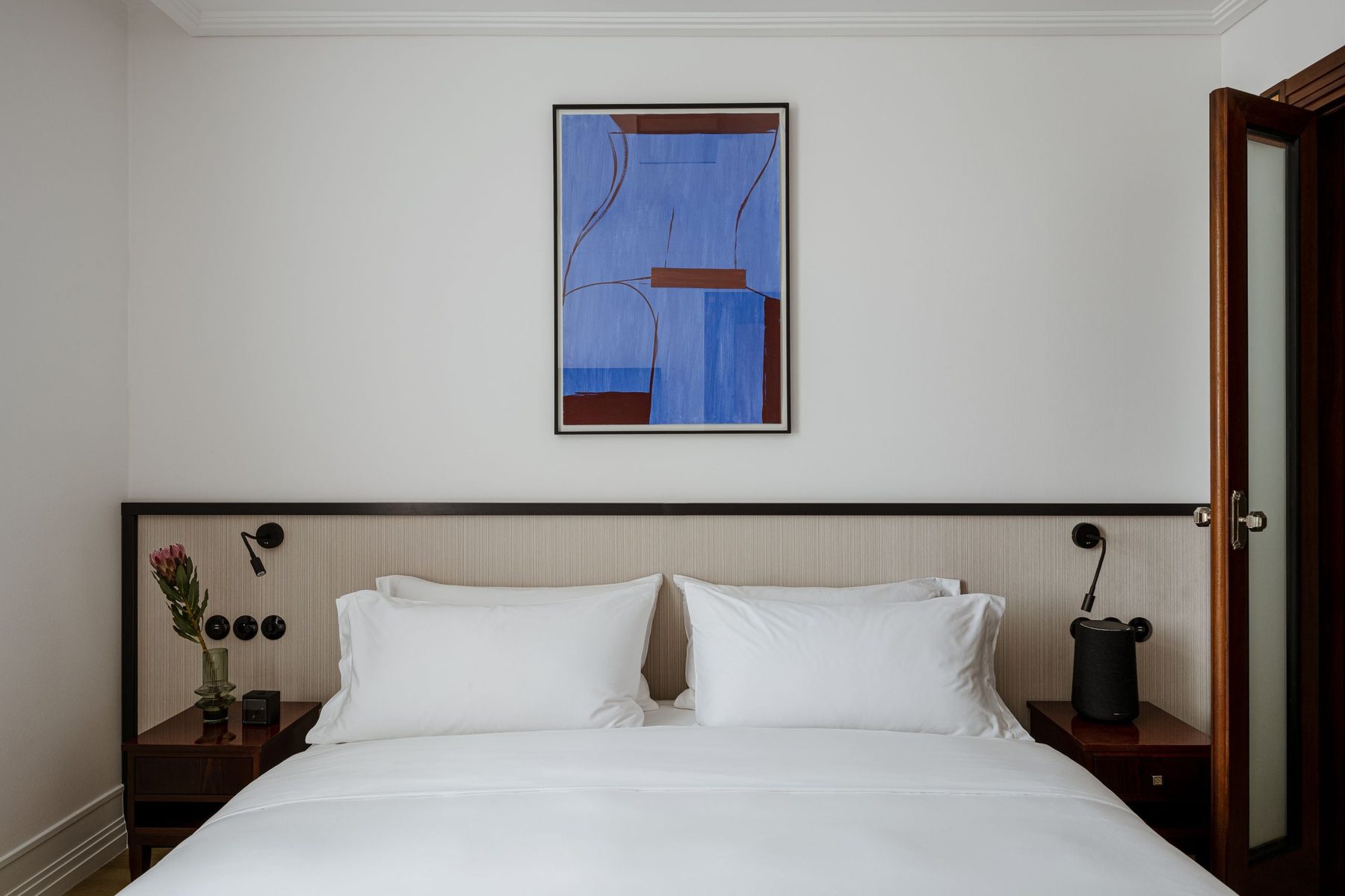 Art Deco Suite bedroom with wood trim at Nobu Warsaw