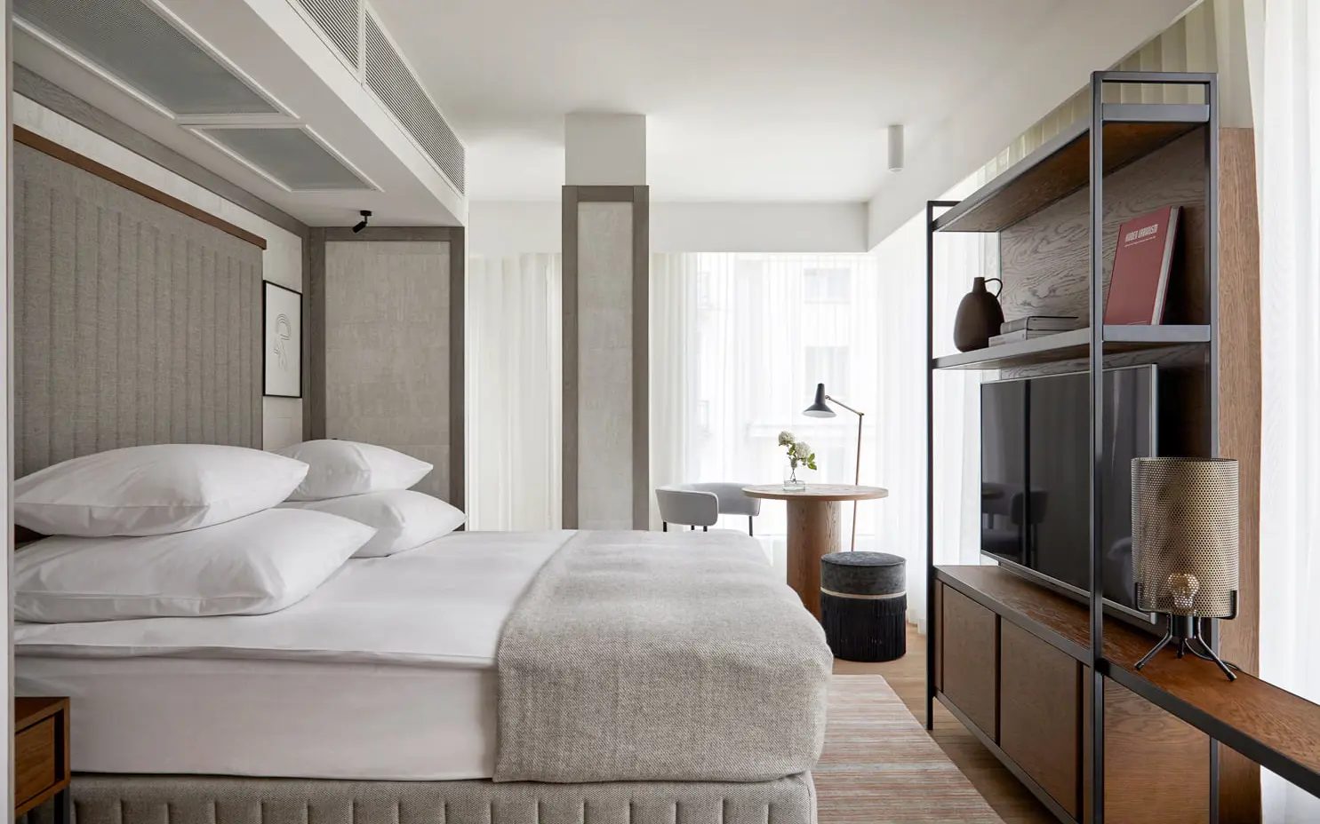 Corner Room bed and shelving at PURO Warsaw Centrum on Widok